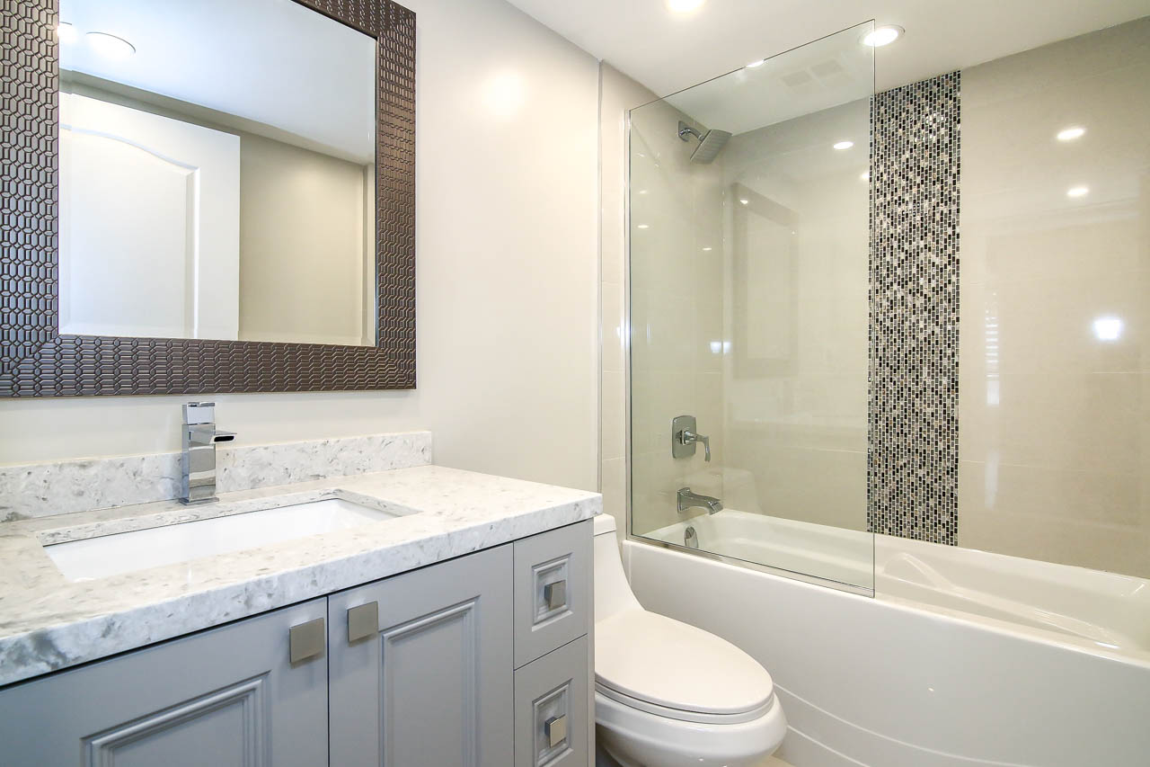 Photo of an renovation project showing a finished interior space without construction materials in view bathroom renovation