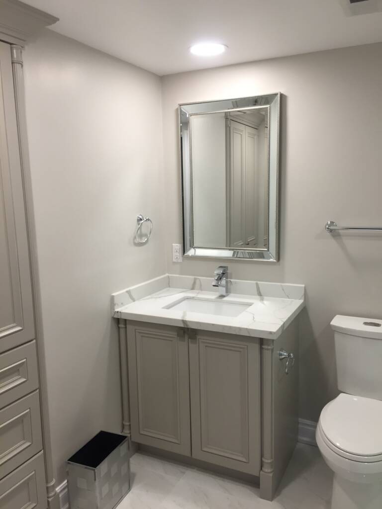 Photo of an renovation project showing a finished interior space without construction materials in view bathroom renovation